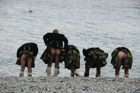 Maybe they're selkies, just about to change form? That, or they're looking for sea shells...lol